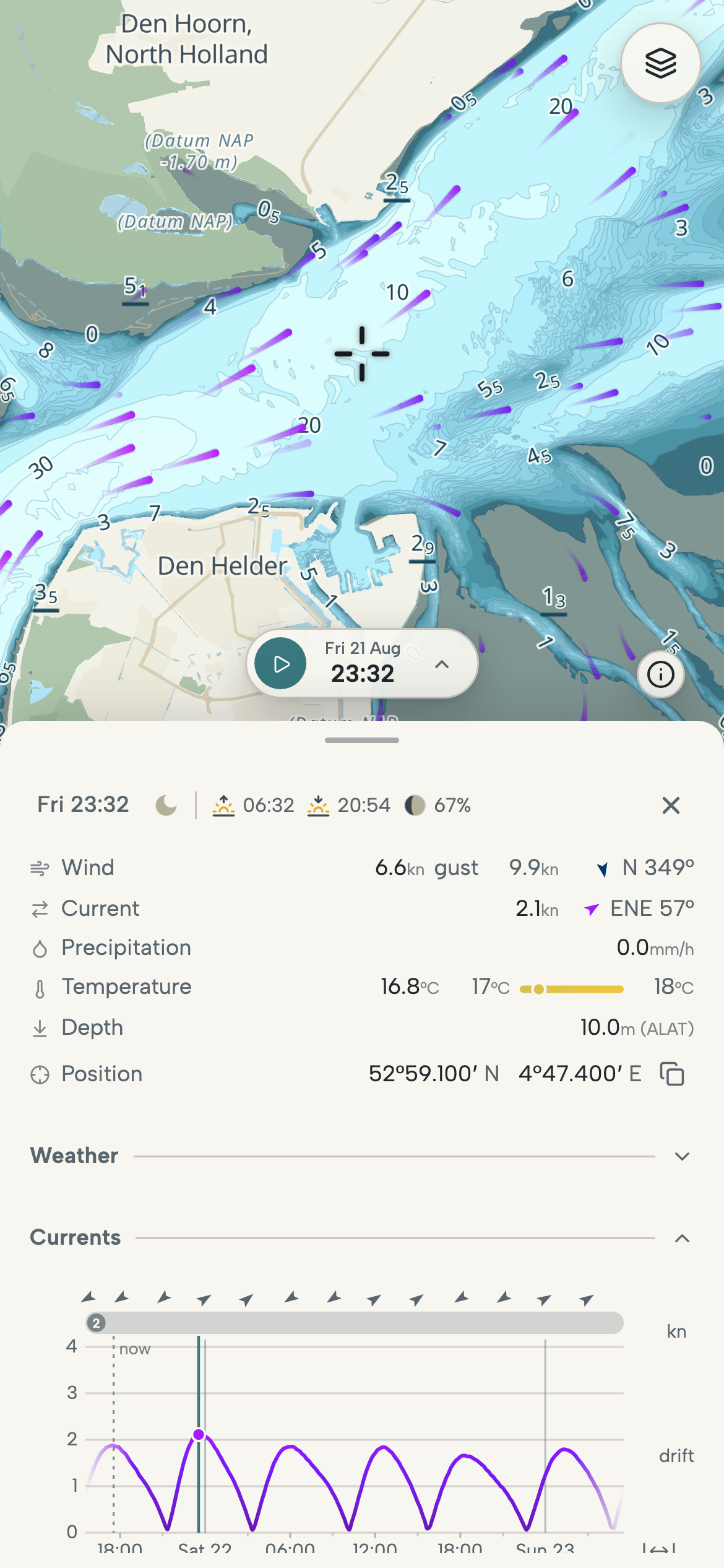 Phone with the tidal current through the Marsdiep between Den Helder and Texel over the depth chart, and the current graph for a chosen point.